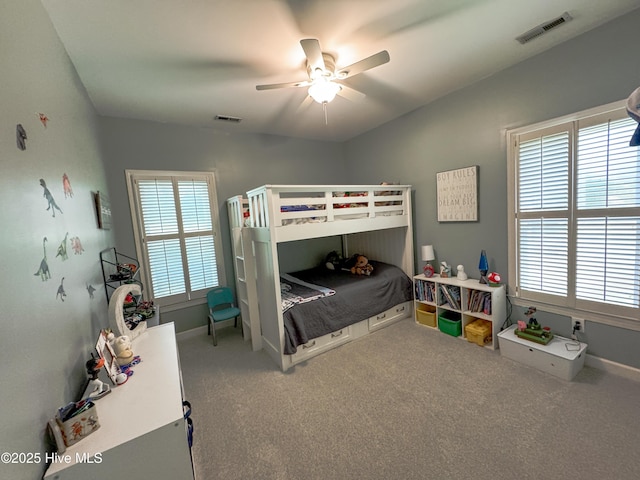 4725 Wedgefield Dr, Wilmington, NC 28409 - bedroom featuring carpet and a ceiling fan