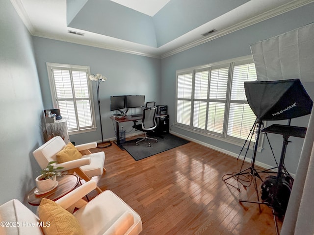 4725 Wedgefield Dr, Wilmington, NC 28409 - office area featuring a raised ceiling, wood finished floors, and crown molding