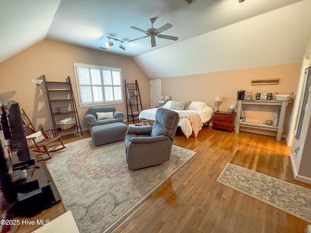 4725 Wedgefield Dr, Wilmington, NC 28409 - bedroom featuring lofted ceiling, wood finished floors, and ceiling fan