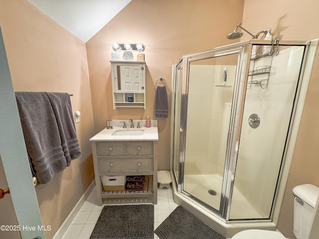4725 Wedgefield Dr, Wilmington, NC 28409 - full bathroom featuring a shower stall, lofted ceiling, tile patterned flooring, and vanity