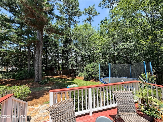 4725 Wedgefield Dr, Wilmington, NC 28409 - deck featuring a trampoline