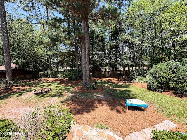 4725 Wedgefield Dr, Wilmington, NC 28409 - view of yard with a fire pit