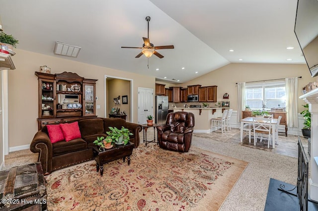 276 Widgeon Way, Lillington, NC 27546 - living room featuring lofted ceiling, a ceiling fan, recessed lighting, and a fireplace