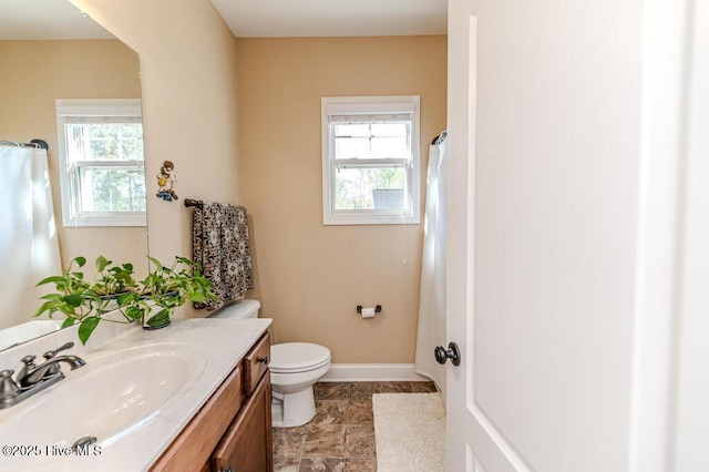 276 Widgeon Way, Lillington, NC 27546 - bathroom featuring vanity, healthy amount of natural light, and a shower with curtain