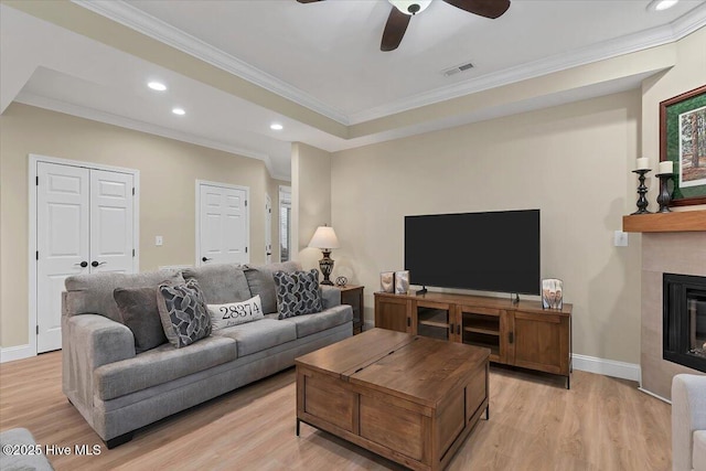 240 Cochrane Castle Cir Unit F, Pinehurst, NC 28374 - living area featuring ornamental molding, ceiling fan, light wood-style flooring, recessed lighting, and a glass covered fireplace