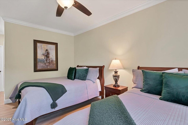240 Cochrane Castle Cir Unit F, Pinehurst, NC 28374 - bedroom with wood finished floors, ornamental molding, and a ceiling fan
