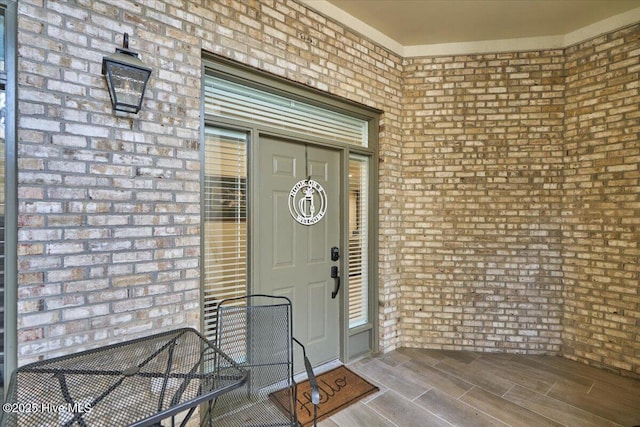 240 Cochrane Castle Cir Unit F, Pinehurst, NC 28374 - view of exterior entry with brick siding