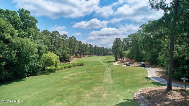 240 Cochrane Castle Cir Unit F, Pinehurst, NC 28374 - view of home's community featuring a lawn, golf course view, and view of scattered trees