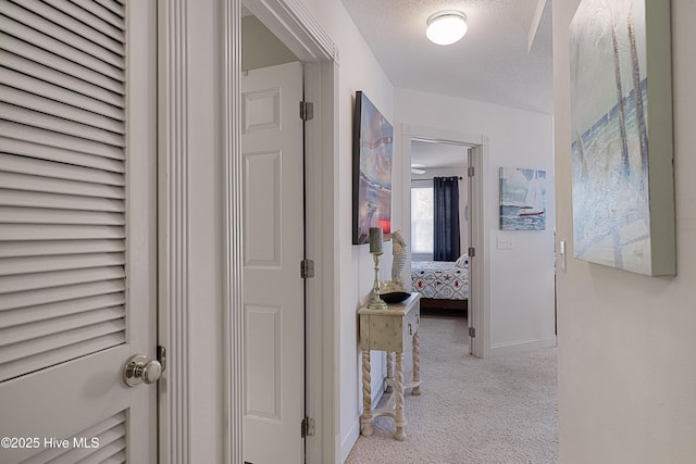 330 S Middleton Dr NW Unit 1009, Calabash, NC 28467 - hall featuring carpet floors and a textured ceiling