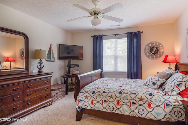 330 S Middleton Dr NW Unit 1009, Calabash, NC 28467 - carpeted bedroom featuring a ceiling fan and a textured ceiling