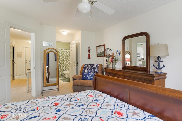 330 S Middleton Dr NW Unit 1009, Calabash, NC 28467 - carpeted bedroom featuring connected bathroom and a ceiling fan