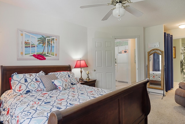 330 S Middleton Dr NW Unit 1009, Calabash, NC 28467 - bedroom with freestanding refrigerator, light colored carpet, and ceiling fan