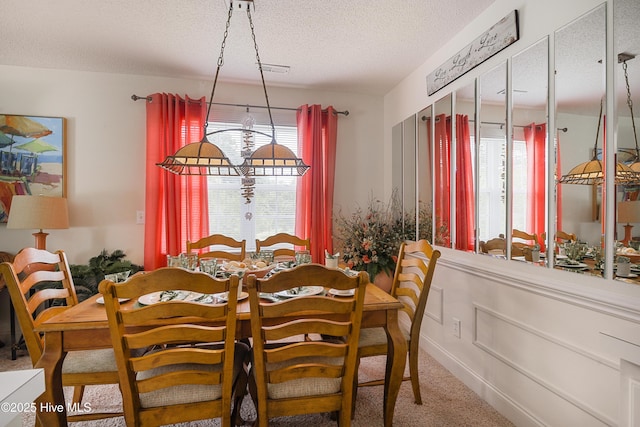 330 S Middleton Dr NW Unit 1009, Calabash, NC 28467 - carpeted dining space with a textured ceiling