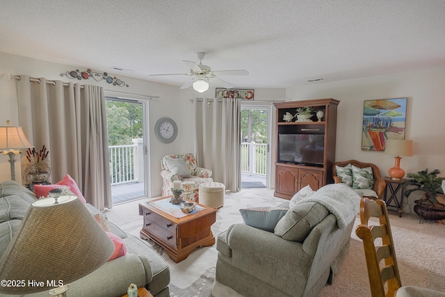 330 S Middleton Dr NW Unit 1009, Calabash, NC 28467 - living area with ceiling fan, a textured ceiling, and light colored carpet
