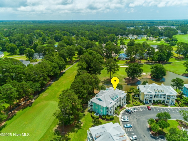 330 S Middleton Dr NW Unit 1009, Calabash, NC 28467 - drone / aerial view of a golf course and a large body of water