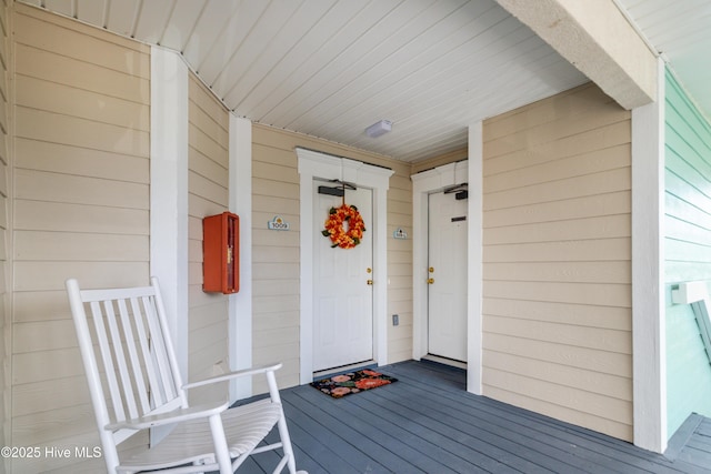 330 S Middleton Dr NW Unit 1009, Calabash, NC 28467 - view of exterior entry featuring covered porch