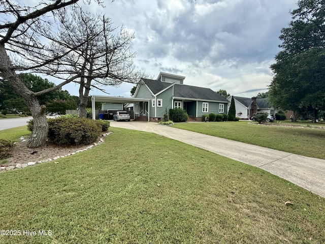 2834 Lancaster Rd NW, Wilson, NC 27896 - view of front facade with driveway, a front lawn, an attached carport, crawl space, and roof with shingles