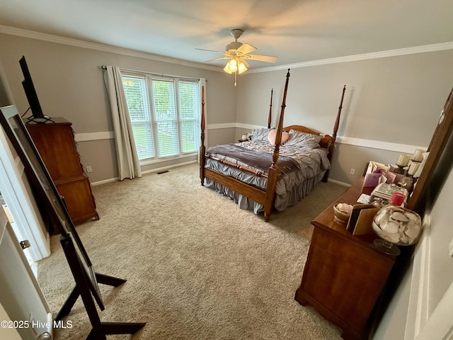 2834 Lancaster Rd NW, Wilson, NC 27896 - carpeted bedroom with ornamental molding and a ceiling fan
