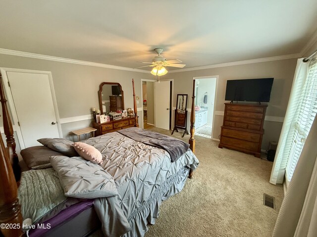 2834 Lancaster Rd NW, Wilson, NC 27896 - carpeted bedroom featuring ornamental molding, ceiling fan, and connected bathroom