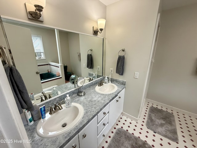 2834 Lancaster Rd NW, Wilson, NC 27896 - full bath featuring double vanity and baseboards