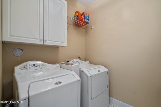 6122 Timber Creek Ln, Wilmington, NC 28411 - washroom featuring washing machine and clothes dryer and cabinet space