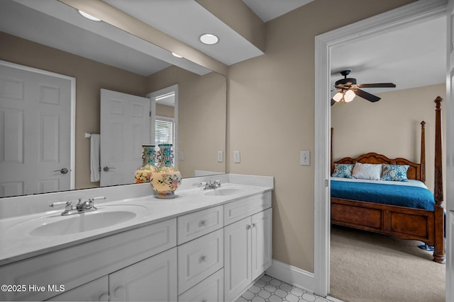6122 Timber Creek Ln, Wilmington, NC 28411 - ensuite bathroom featuring double vanity, ceiling fan, and tile patterned floors