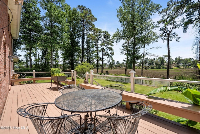 6122 Timber Creek Ln, Wilmington, NC 28411 - wooden terrace featuring outdoor dining space