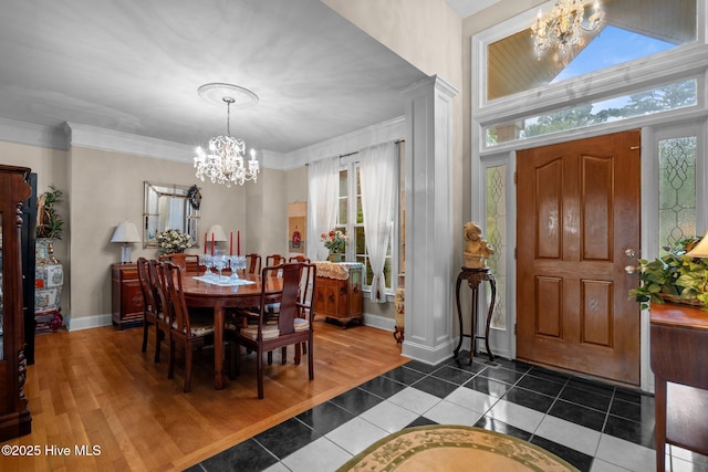 6122 Timber Creek Ln, Wilmington, NC 28411 - tiled dining area with a chandelier and ornamental molding