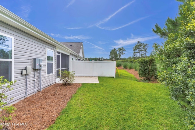 6468 Merceron St SW, Ocean Isle Beach, NC 28469 - view of yard with a patio area