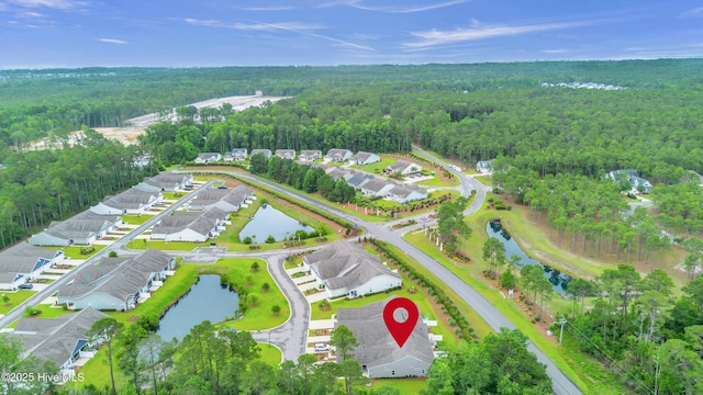 6468 Merceron St SW, Ocean Isle Beach, NC 28469 - aerial overview of property's location featuring a large body of water and nearby suburban area