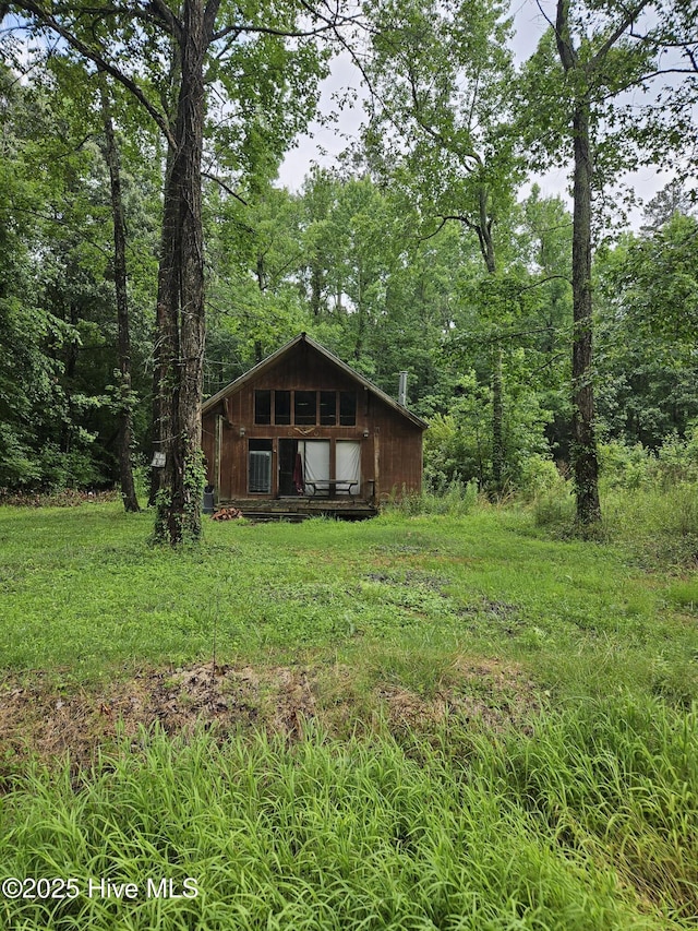 109 Pinewood Trl, Hertford, NC 27944 - view of front of home featuring a wooded view
