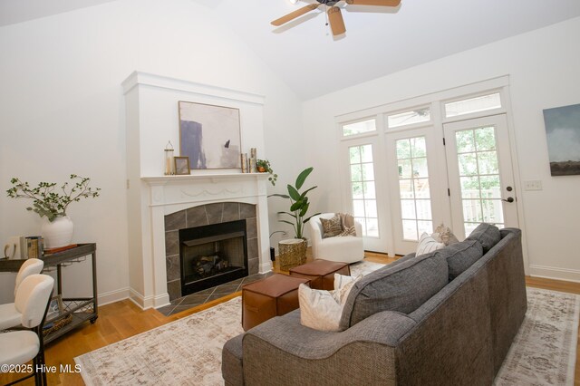2 Tyler Way, Pinehurst, NC 28374 - living room featuring a fireplace, wood finished floors, ceiling fan, and high vaulted ceiling
