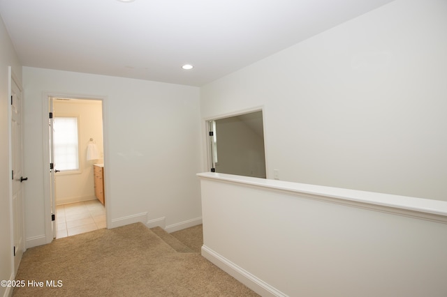 2 Tyler Way, Pinehurst, NC 28374 - corridor with light colored carpet, recessed lighting, an upstairs landing, and light tile patterned flooring