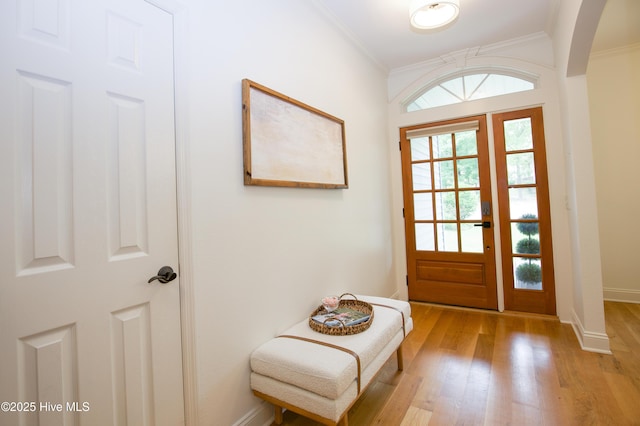2 Tyler Way, Pinehurst, NC 28374 - entryway featuring crown molding, light wood finished floors, and arched walkways