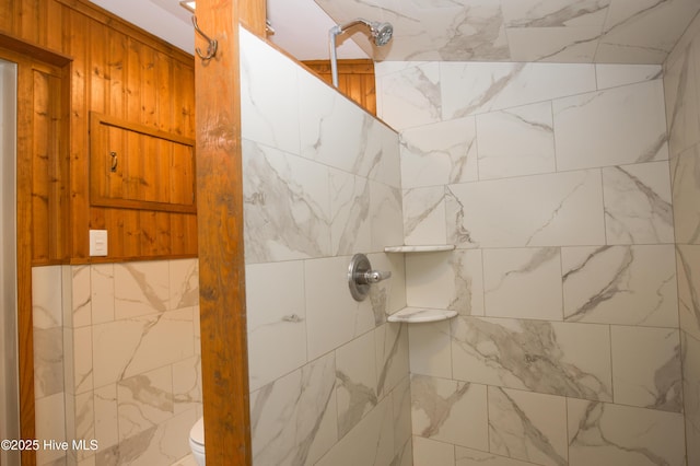 615 E Main St, Aberdeen, NC 28315 - bathroom featuring a tile shower and toilet