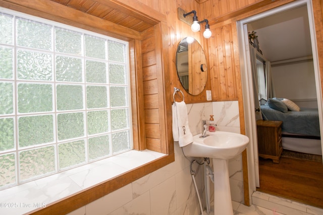 615 E Main St, Aberdeen, NC 28315 - ensuite bathroom featuring wooden walls