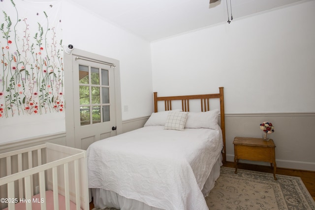 615 E Main St, Aberdeen, NC 28315 - bedroom featuring wood finished floors and ceiling fan