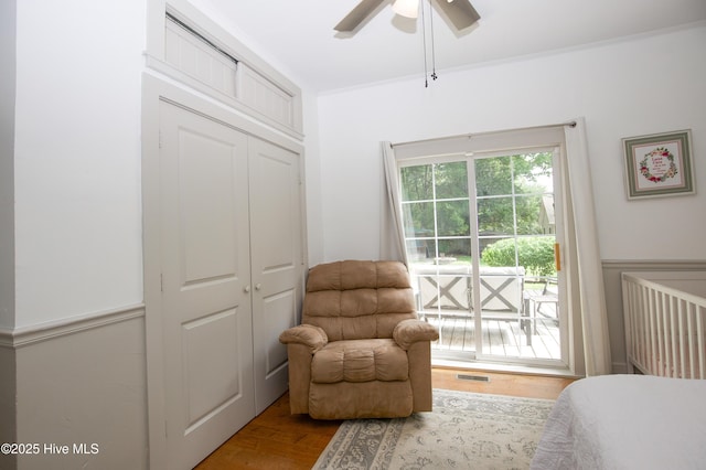 615 E Main St, Aberdeen, NC 28315 - bedroom featuring wood finished floors, a closet, and a ceiling fan