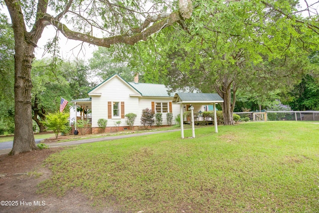 615 E Main St, Aberdeen, NC 28315 - ranch-style house with a metal roof, a chimney, and crawl space