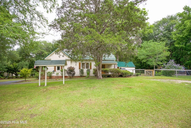 615 E Main St, Aberdeen, NC 28315 - view of front of house with a metal roof