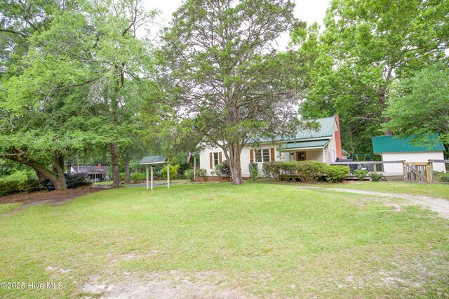 615 E Main St, Aberdeen, NC 28315 - view of yard with an outbuilding