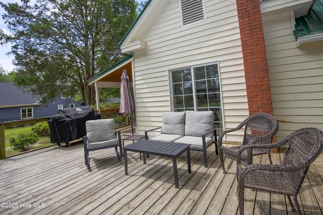 615 E Main St, Aberdeen, NC 28315 - deck featuring outdoor lounge area and area for grilling