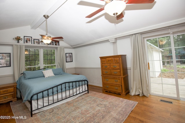 615 E Main St, Aberdeen, NC 28315 - bedroom with wood finished floors, ceiling fan, and access to outside