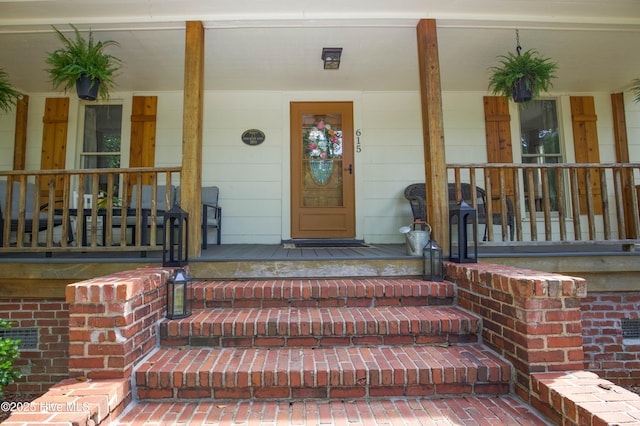 615 E Main St, Aberdeen, NC 28315 - view of exterior entry with a porch