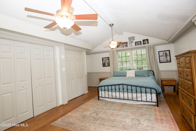 615 E Main St, Aberdeen, NC 28315 - bedroom featuring wood finished floors, two closets, and ceiling fan