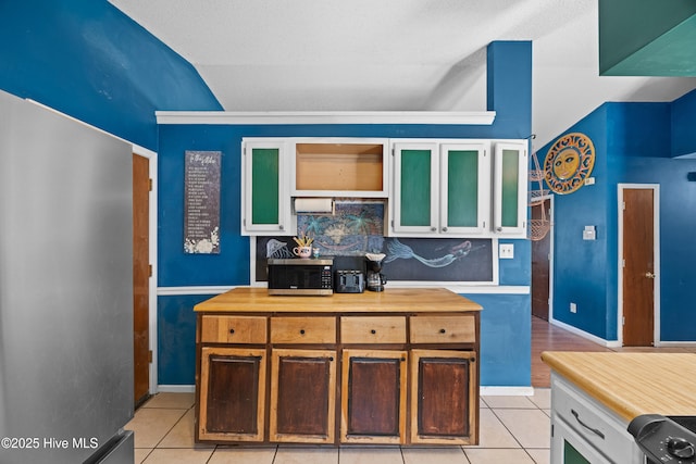 608 Calabash Dr, Hubert, NC 28539 - kitchen featuring light tile patterned floors, stainless steel appliances, and butcher block countertops