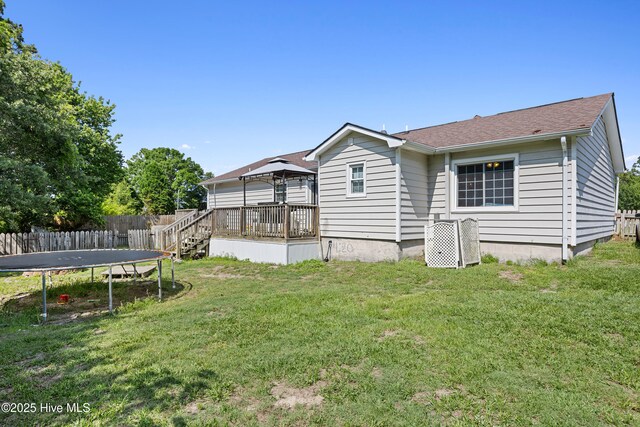 608 Calabash Dr, Hubert, NC 28539 - rear view of property with a gazebo, a trampoline, and roof with shingles