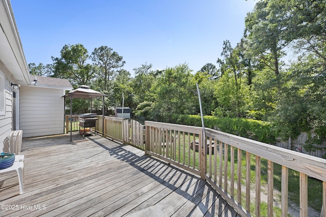 608 Calabash Dr, Hubert, NC 28539 - wooden terrace with a gazebo and a grill