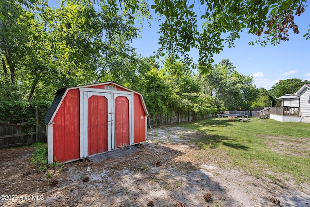 608 Calabash Dr, Hubert, NC 28539 - view of shed featuring a fenced backyard and view of wooded area