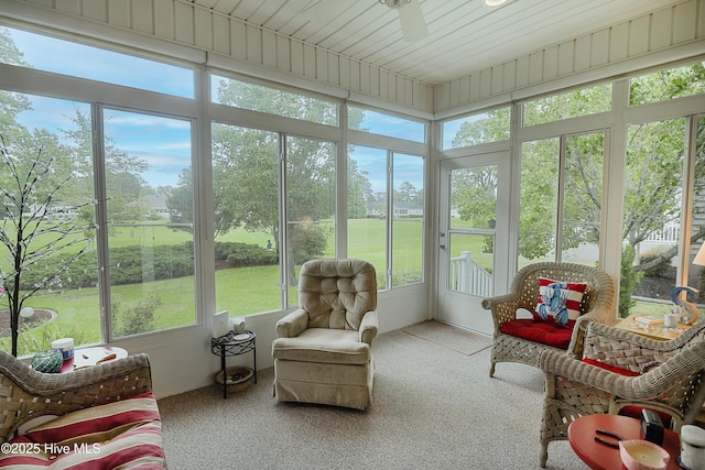1045 Edenton Dr NW, Calabash, NC 28467 - sunroom featuring a ceiling fan and carpet floors